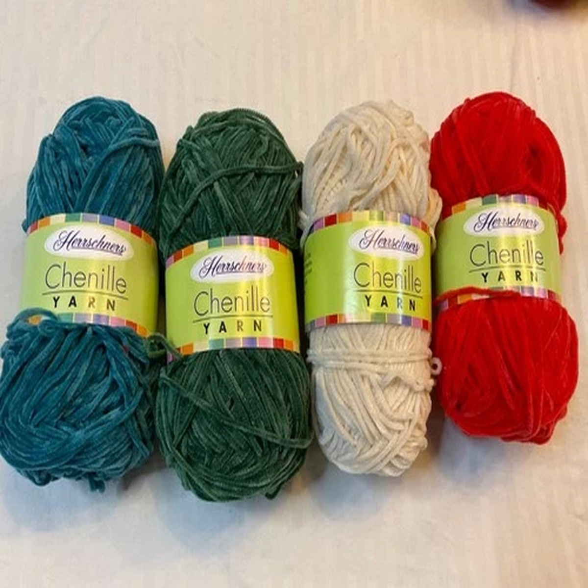 $2. For 1 mini skein.  OBO.  Herrschners Chenille Yarn. various colors